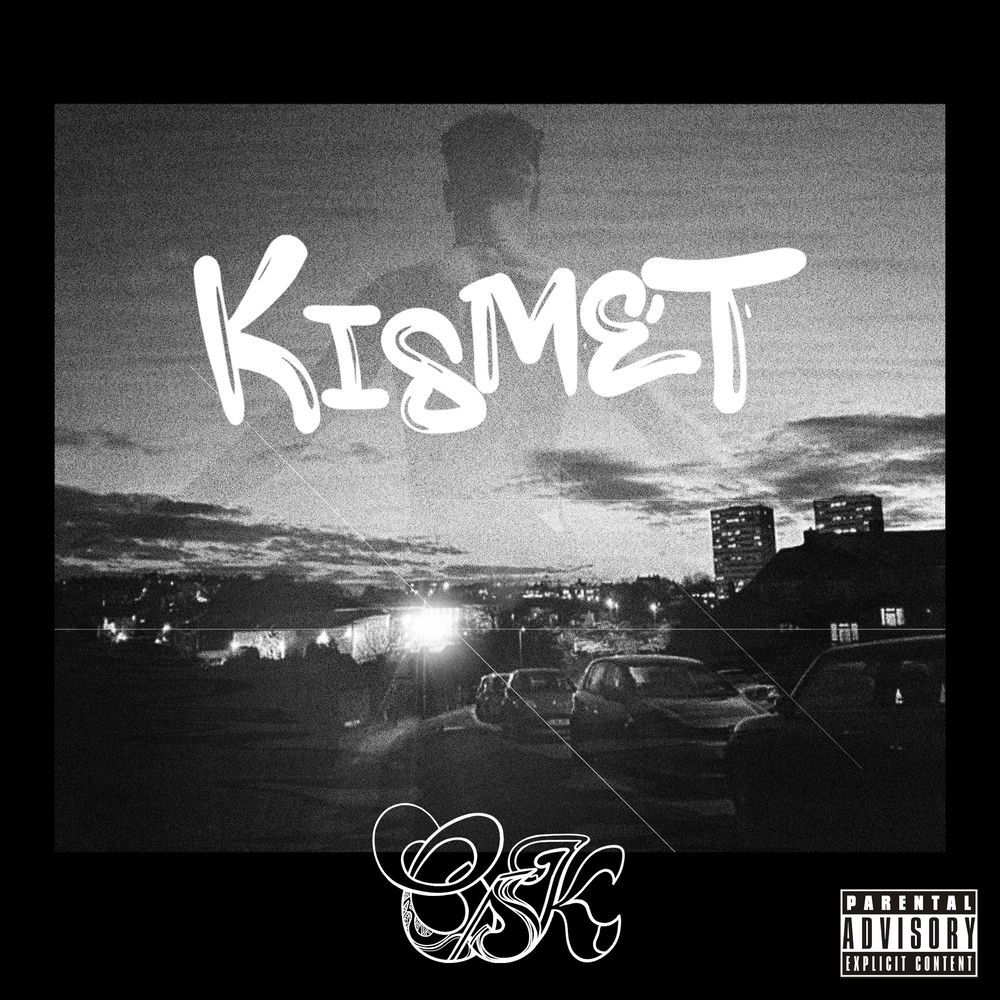 Kismet cover: black and white estate at night with KISMET painted in marker.
