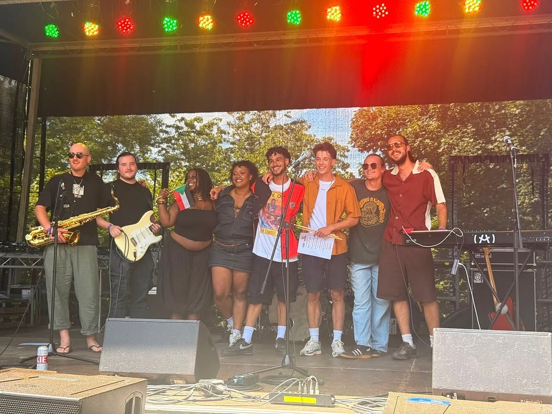 OSK, the band and the crew lined up together on stage under a string of coloured lights after the set.